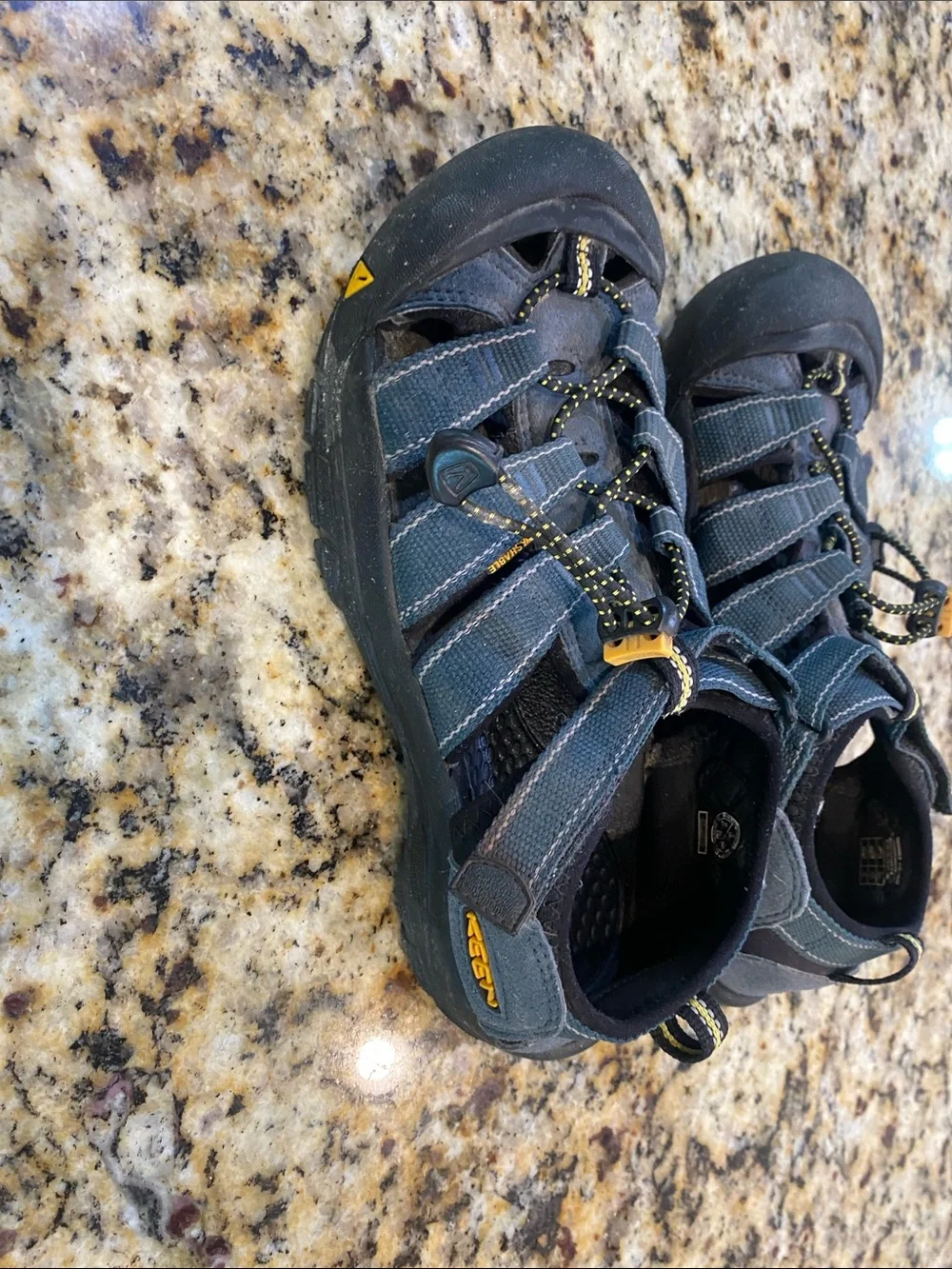 Keen Men's Navy Blue Closed-Toe Outdoor Sandals with Yellow Accents